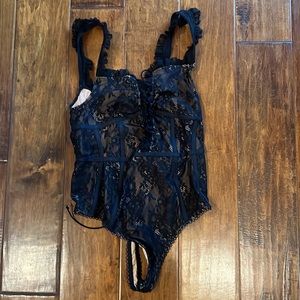 Black laced one piece suit
